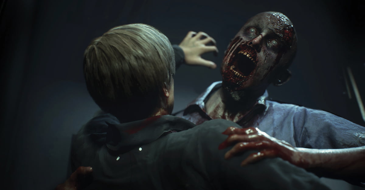 A zombie lunges at Leon Kennedy from Resident Evil 2