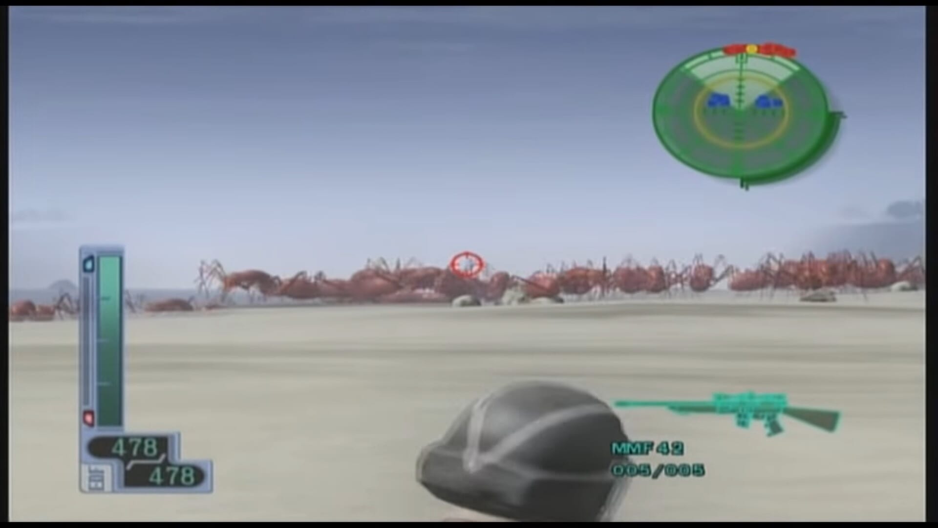 a horde of red ants rushes toward the player across a beach
