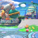 Kirby and the Forgotten Land - kirby walks by a welcome sign for an amusement park