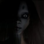 Kuon - a ghostly woman stares blankly
